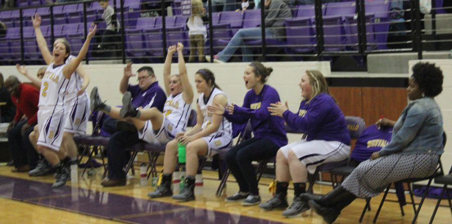 The+bench+explodes+as+freshman+Jordan+Jenkins+hits+a+three+at+the+buzzer+to+put+the+Lady+Bison+on+top+of+the+Riesel+team+and+the+district.+The+girls+will+take+on+Anderson-Shiro+next+week+in+the+first+round+of+the+playoffs.