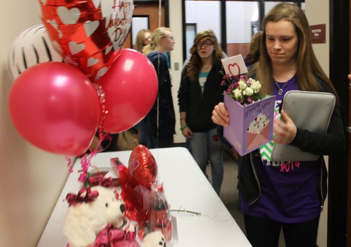 Freshman Kynlee Driskill picks up her Valentine at the end of the school day.
