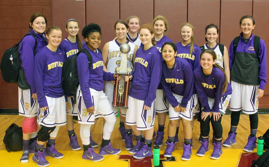 The Lady Bison show off their trophy after taking second place at the tournament in Fairfield. 