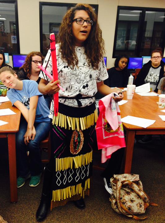 Senior Miryam Zapata shares some of the items and dress used in her culture's dances.