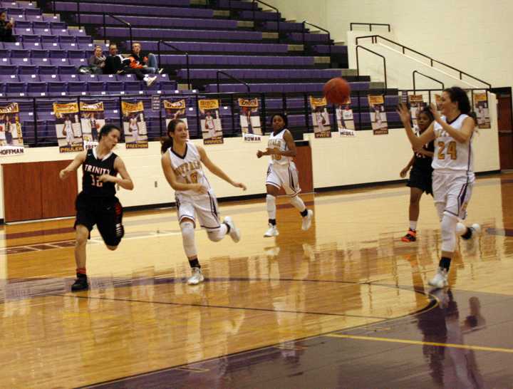 Laduren Pate passes the ball to teammate Allison Grissett during the Lady Bisons final district game. 