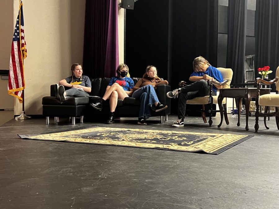Performers Ashtyn Barzda, Ryan Brown, Raegyn Dennix and Kaylee Trumbull hang out in the study while they wait their turn in a scene.