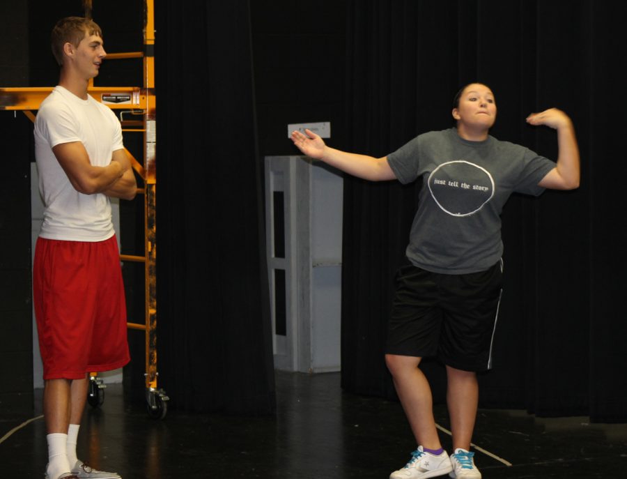 Senior Kortni Hibbard works on her comedia skills during a Saturday workshop for students interested in being a part of this years OAP. Senior Tyler Adams looks on. 