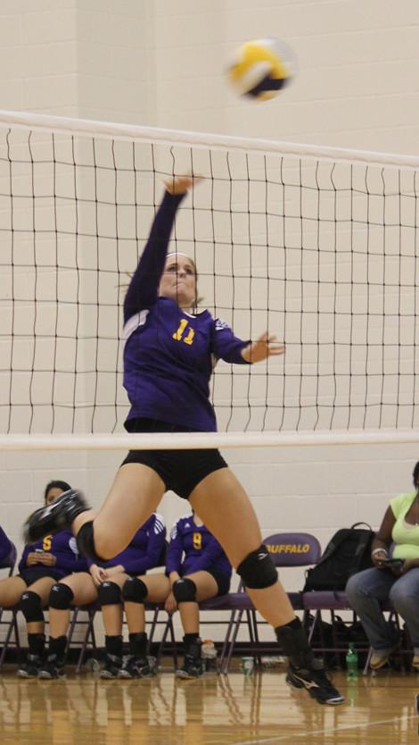 Senior Taylor Rutledge goes up for the kill. The Lady Bison made their early-season goal of making the playoffs, but lost out in their Bi-District bid against Anderson-Shiro.