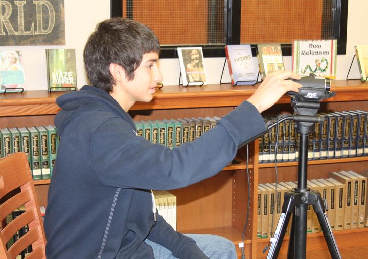 Video production students film faculty members