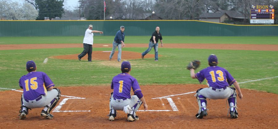 Community members throw out the first pitch before starting the games at the new baseball and softball complex. Pitchers are, from left to right, are Monty McGill, Kent St. Pe, and Dominic Benoit. Catchers are Clay McGill, Logan Jones, and Trey Minter.