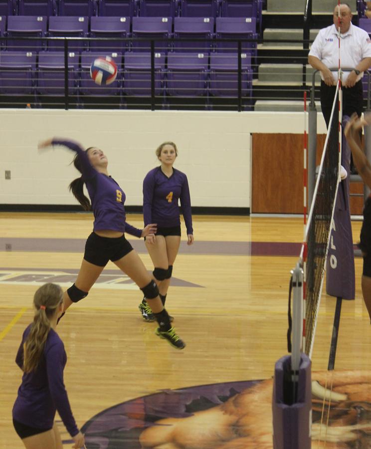 Volleyball+player+Allison+Grissett+catches+some+air+as+she+sends+the+ball+back+over+the+net+during+the+game+against+Westwood+Tuesday+night.+After+both+a+win+and+a+loss+in+the+past+week%2C+the+girls+hope+to+beat+Crockett+Friday+night.