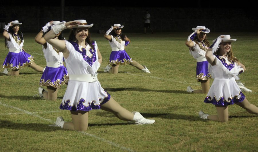 The Bison Belles show off their moves during a halftime show.