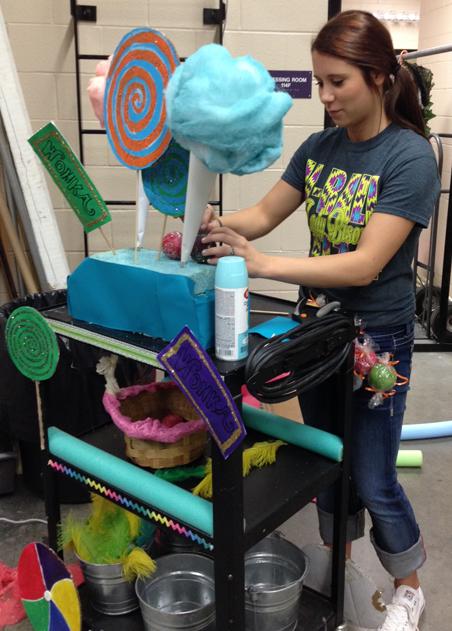 Senior Marissa Jones works on a prop for Willy Wonka and the Chocolate Factory.