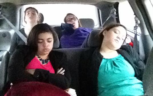 Debaters riding with coach Jill Henson try to catch up on their sleep on the early-morning drive from Buffalo to Belton for a speech meet.