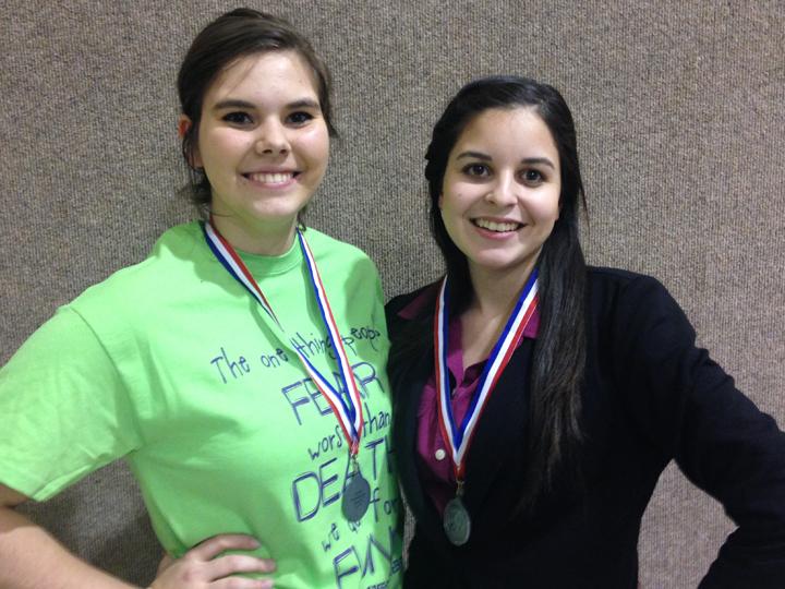 Juniors Kaci Allen and Kendall Morales show off their medals after placing second in district CX Debate. They will compete in the state meet in March.