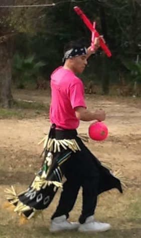 Junior Luis Ortiz participates in a traditional Mexican dance.