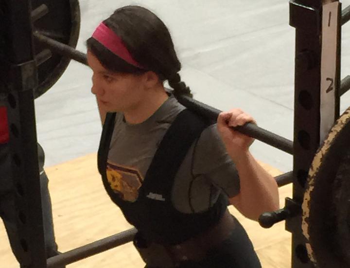 Freshman Taylor Lack competes during the first powerlifting meet of the year.