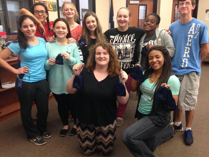 The journalism staff shows off medals won in this years ILPC competition. Both publications took top honors.
