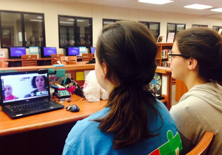 Kendall Morales and Lilah Molina participate in an international video conference with students and teachers from Saudi Arabia.