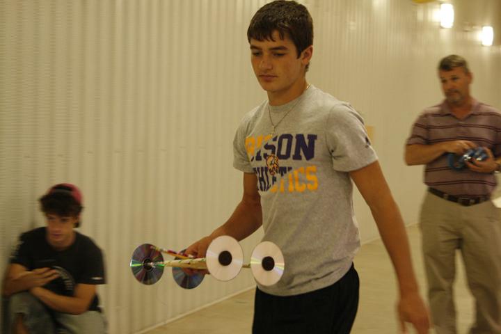 Junior Shelley Pate gets ready to race his mouse trap car.