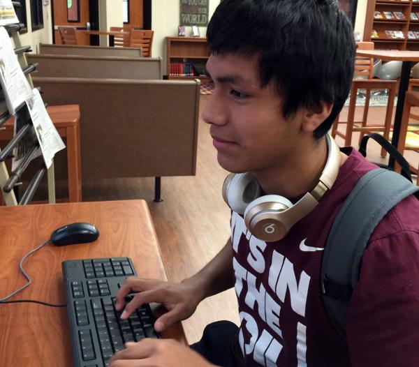 Sophomore Jordy Maltos works on a speech assignment in the library. Jordy is a part of the competitive speech and debate team.