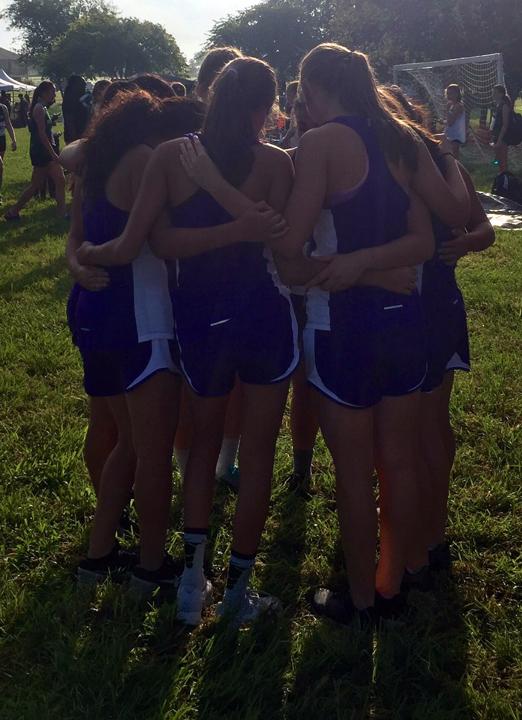 The XC girls get ready to run before a meet. srubel photo