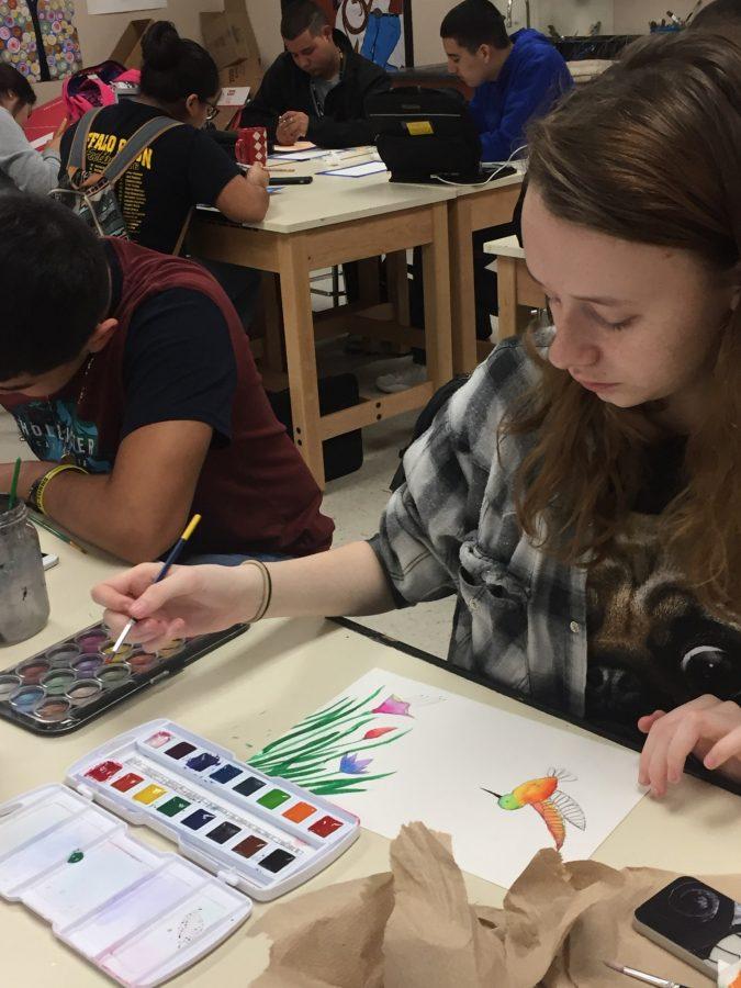 Art students learn to use watercolors