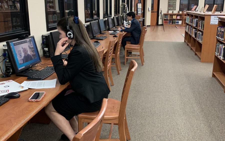 Debater competitors Nicolette Arabie and Omar Almeida competed through the early hours of the winter storm but then had to postpone finals when UIL decided to wait because so many students were losing power and Internet.