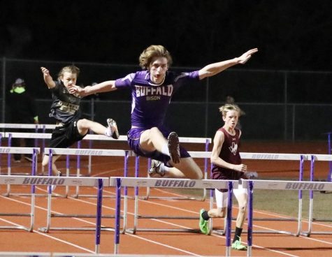 Kaden Adams focuses on the finish line during the hurdles. The district meet was held in Crockett this week.