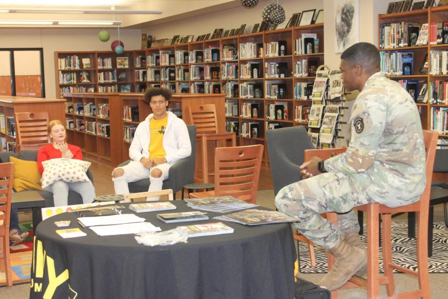 Kyle Harrison and his classmates listen to the Army representatives spiel.