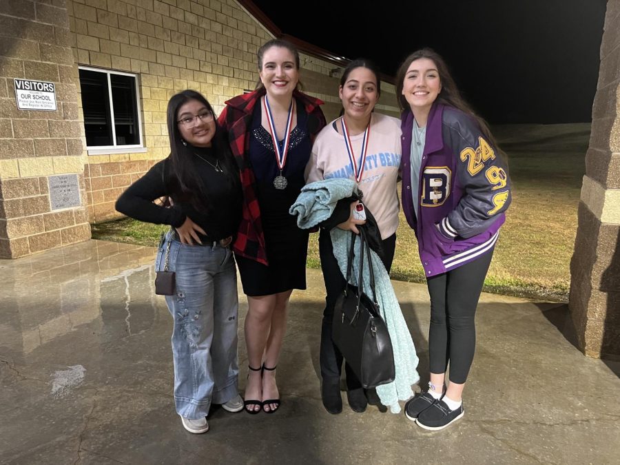 Nicolette Arabie and Kaylen Sanchez show off their medals along with Yuliet Gonzalez and Evalngeline Arabie. The students, along with Tristan Cole and Lindsey Hardin, competed at an invitational meet in Waco.