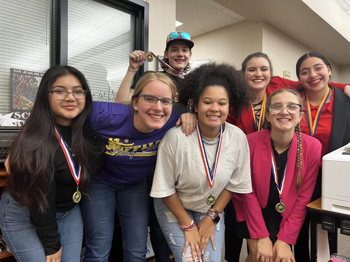 Speech and debate students celebrated their wins after hosting a meet on Saturday. 