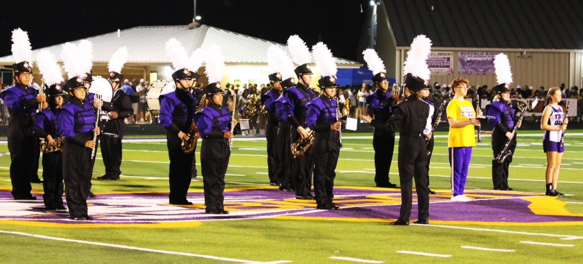 The Bison Brigade perform at a home game halftime. They will compete later this month. 