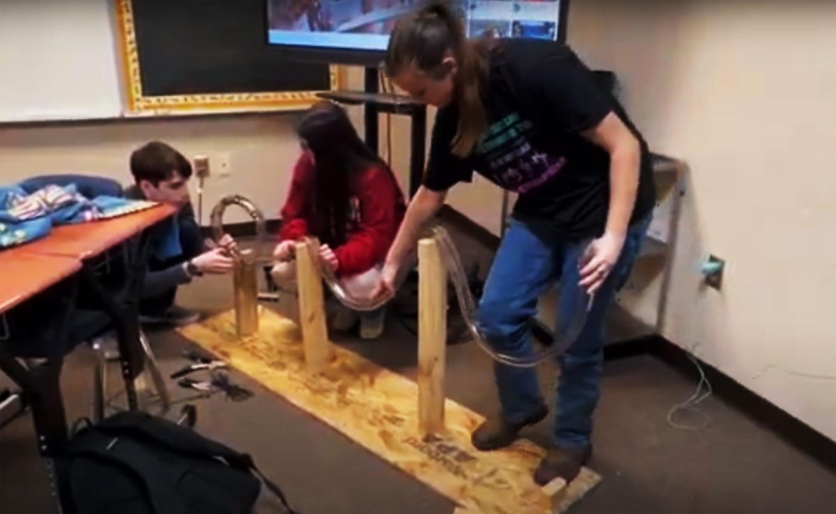 Physics students work on their roller coasters. The project was their semester final for physics class. 