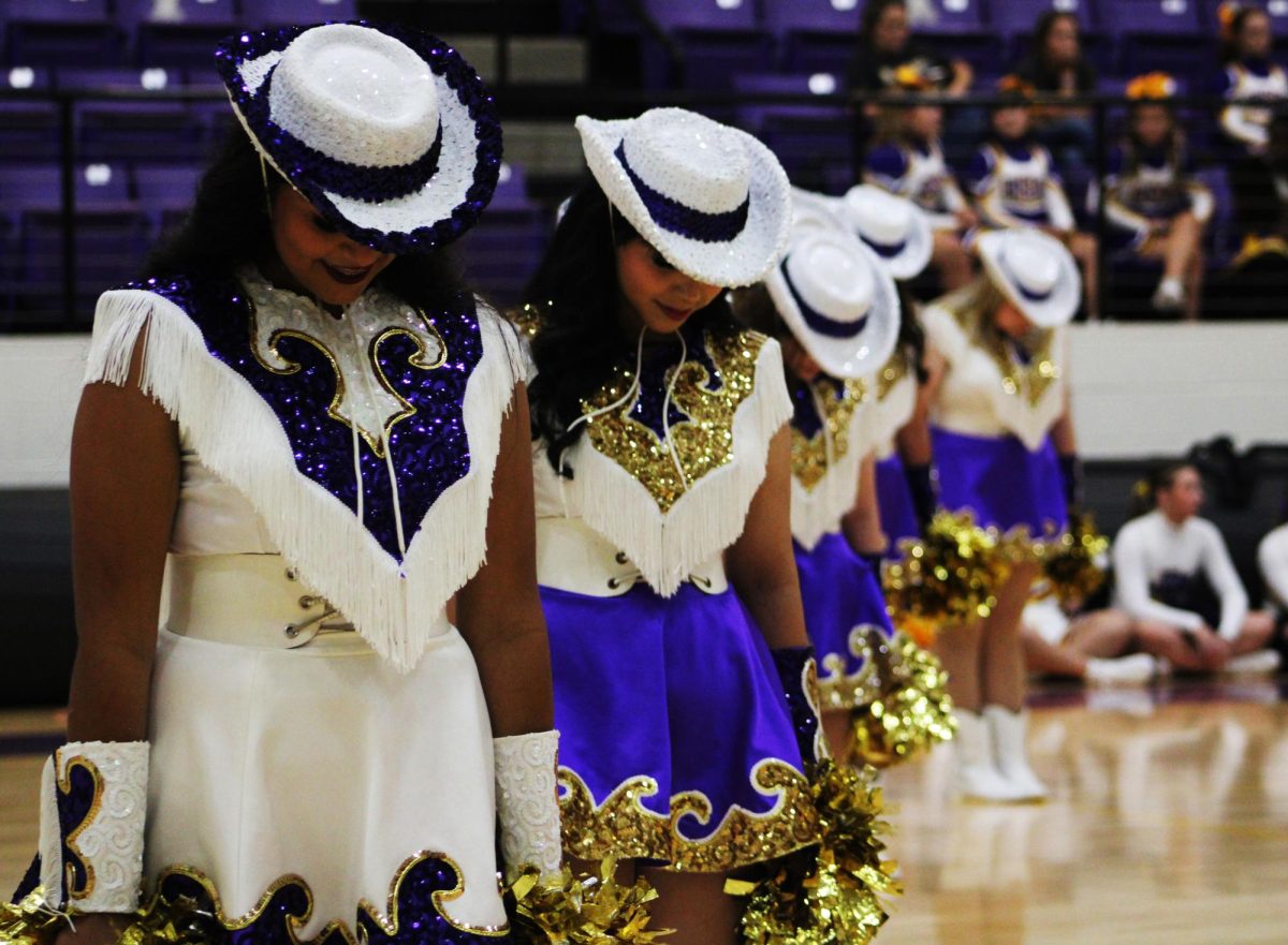 The Bison Belles line up to perform at Meet the Bison. The event marks the group's first live performance each year. 