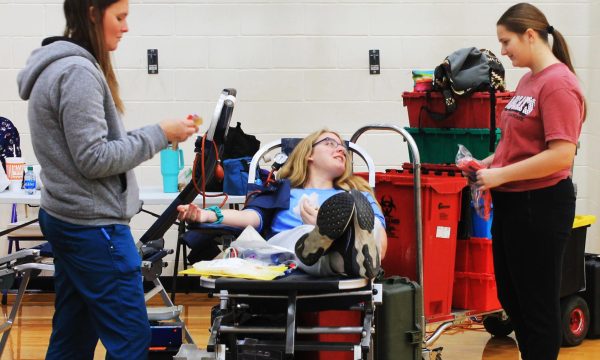 Senior Tristan Cole donates blood last year during the NHS blood drive. Tristan qualified for state in LD debate last year and is working to repeat the accomplishment this year.