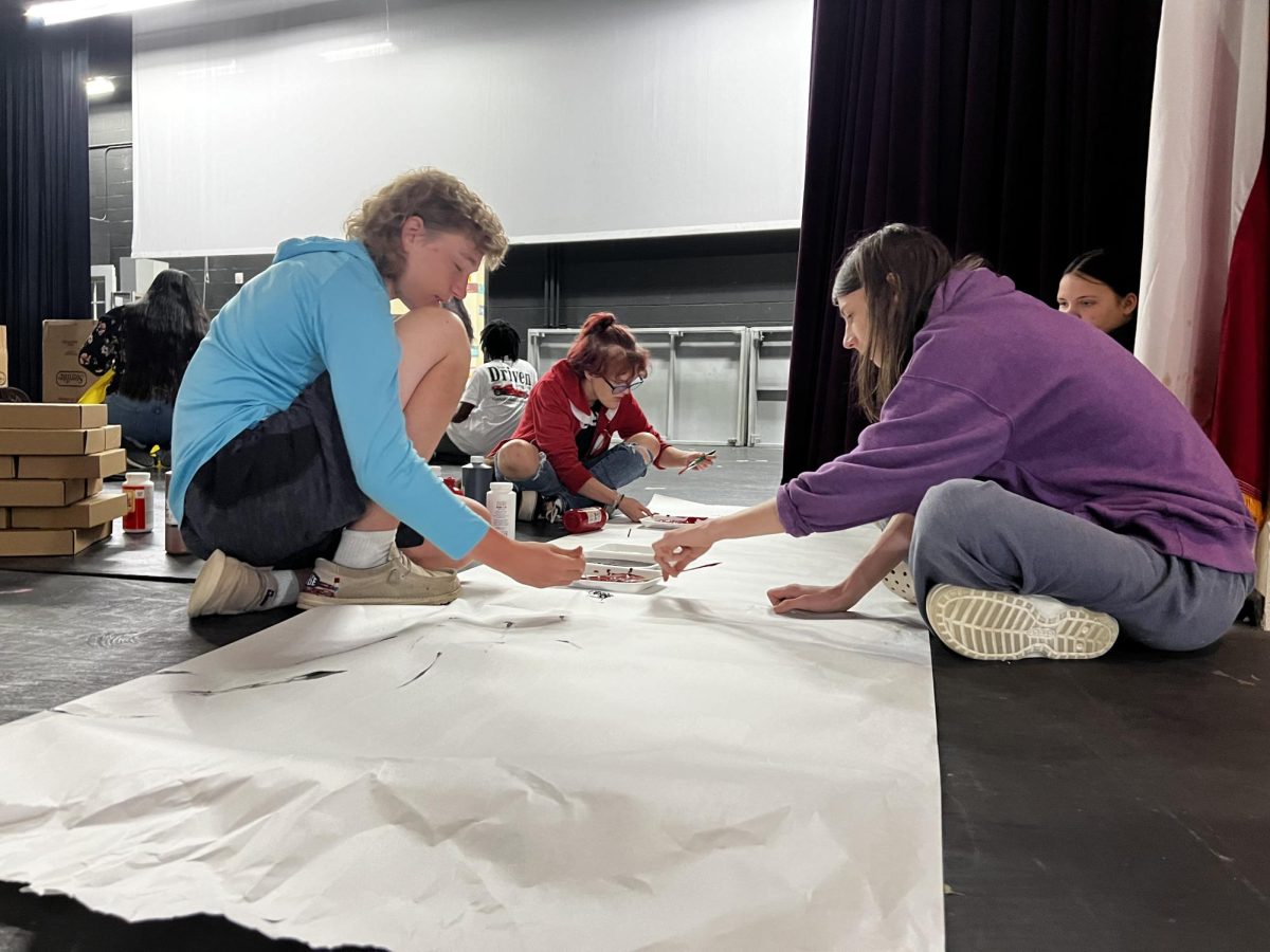 Theatre tech students Taylor McDaniel and Joseph Slay work on props for the theatre kiddie camp. Taylor is also on tech crew for Southern Fried Funeral.