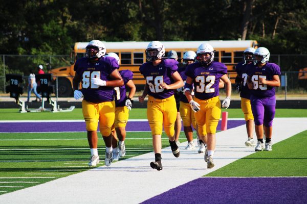 The Bison head to the sidelines to start their scrimmage against Mexia last week.