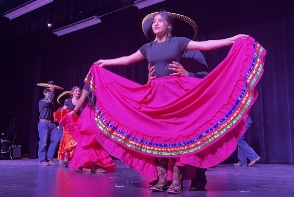 Sophomore Millie Pena dances in the Hispanic Heritage program. She said the performances are important to help people outside of the Hispanic culture to learn about their customs and traditions. 