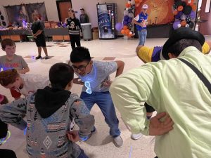 Brigade members compete in one of the games at the group's Halloween party. The group hosts the event every year. 