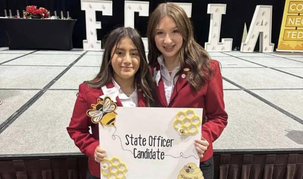 Outgoing state officer Madison Gilliam poses with new state officer Yurit Espino. The election took place at the district convention in Galveston this weekend. 